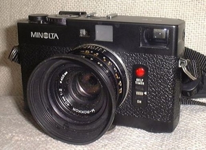Minolta CLE l:300, h:218, 74991, JPEG Minolta CLE l:300, h:218, 74991, JPEG