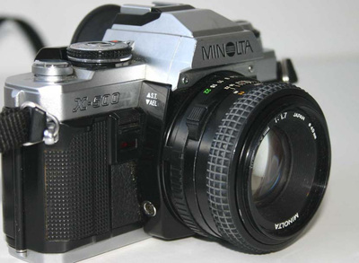 Objectif 50mm et Minolta X500 l:400, h:293