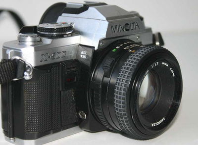Objectif 50mm et Minolta X500 l:400, h:293 Objectif 50mm et Minolta X500 l:400, h:293